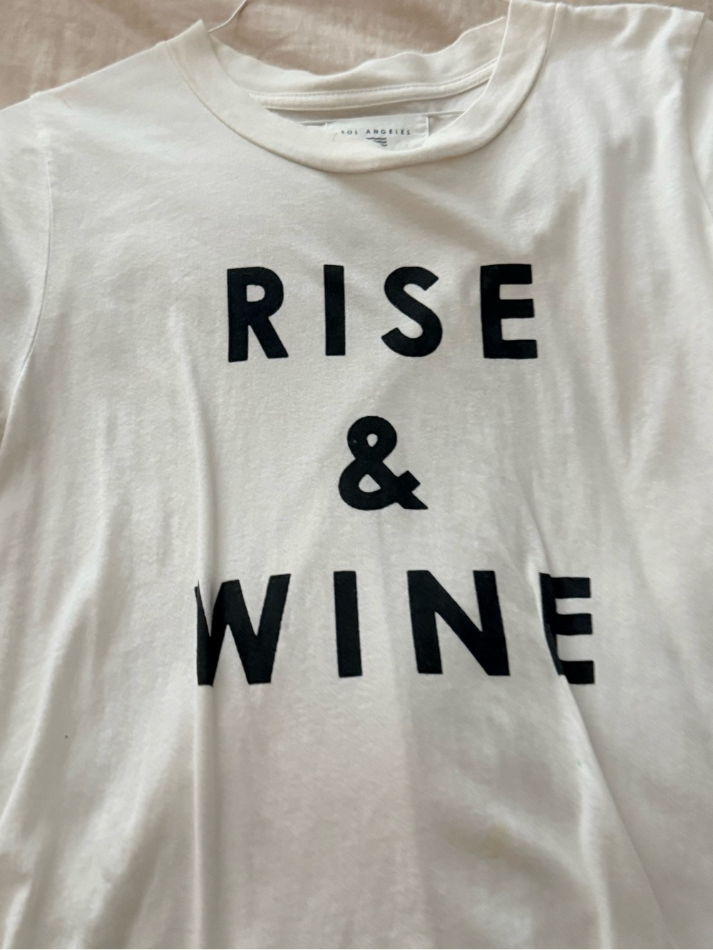 Sol Angeles White Short Sleeve Tee with Black "RISE & WINE" Graphic